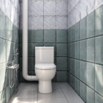 c WC étroit carrelé avec plomberie apparente